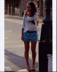 Madison Wolfe On Sidewalk Photo Print in Blue and White Shorts