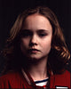 Johnny Sequoyah headshot photo print in red jacket
