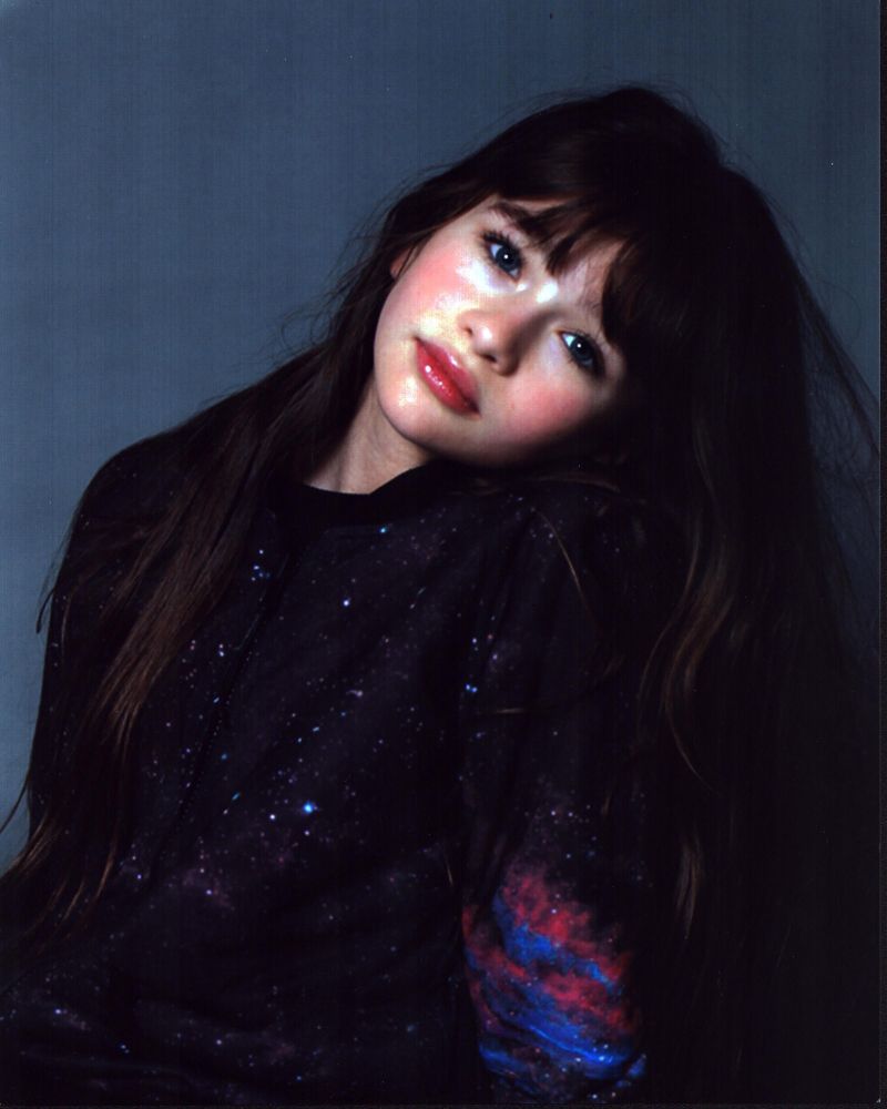 Malina Pauli Weissman in Galaxy Photo Print showcasing vibrant cosmic imagery.