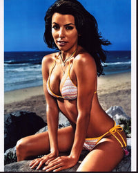 Eva Longoria Relaxing on Rock in Yellow Bikini Photo Print