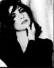 Black and white photo print of Gloria Estefan with hand on neck