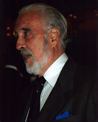 Christopher Lee in gray suit at an event photo print
