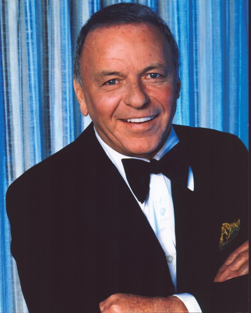 Frank Sinatra in tuxedo with blue background photo print.