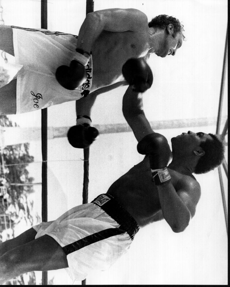 Muhammad Ali hitting Joe Bugner black and white photo print.