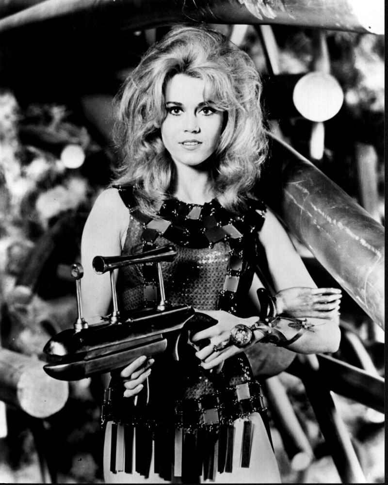 Jane Fonda holding a gun in Barbarella black and white photo print.