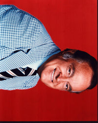 Bob Hope in black and white blazer with red background photo print