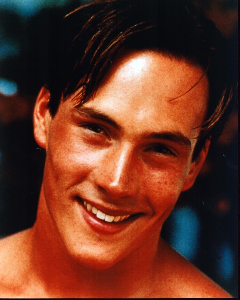 Close-up smiling photo print of Chris Klein showcasing his charming smile.