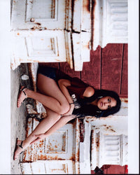 Jasmine V posed in stylish shorts and off-shoulder top photo print.
