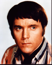 Kenneth Cope headshot photo print in striped shirt.