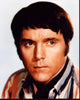Kenneth Cope headshot photo print in striped shirt.