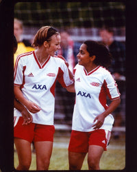 Keira Knightley and Parminder Nagra in Bend It Like Beckham photo print