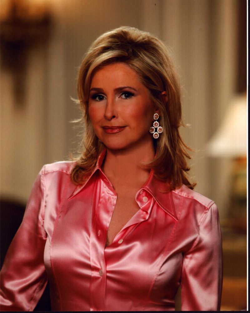 Kathy Hilton headshot photo print in pink silk shirt.