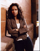 Gugu Mbatha-Raw Leaning On Brick Wall Photo Print in various sizes.