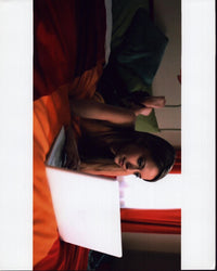 Taryn Southern Laying on Bed with Laptop Photo Print