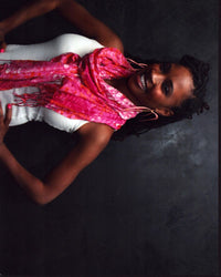 Shanola Hampton photo print with pink scarf and hands on hips