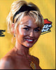 Kelly Carlson close-up photo print with black headband and gold necklace.