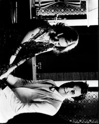 Black and white photo print of Nicole Kidman and Robbie Williams holding hands in Something Stupid music video