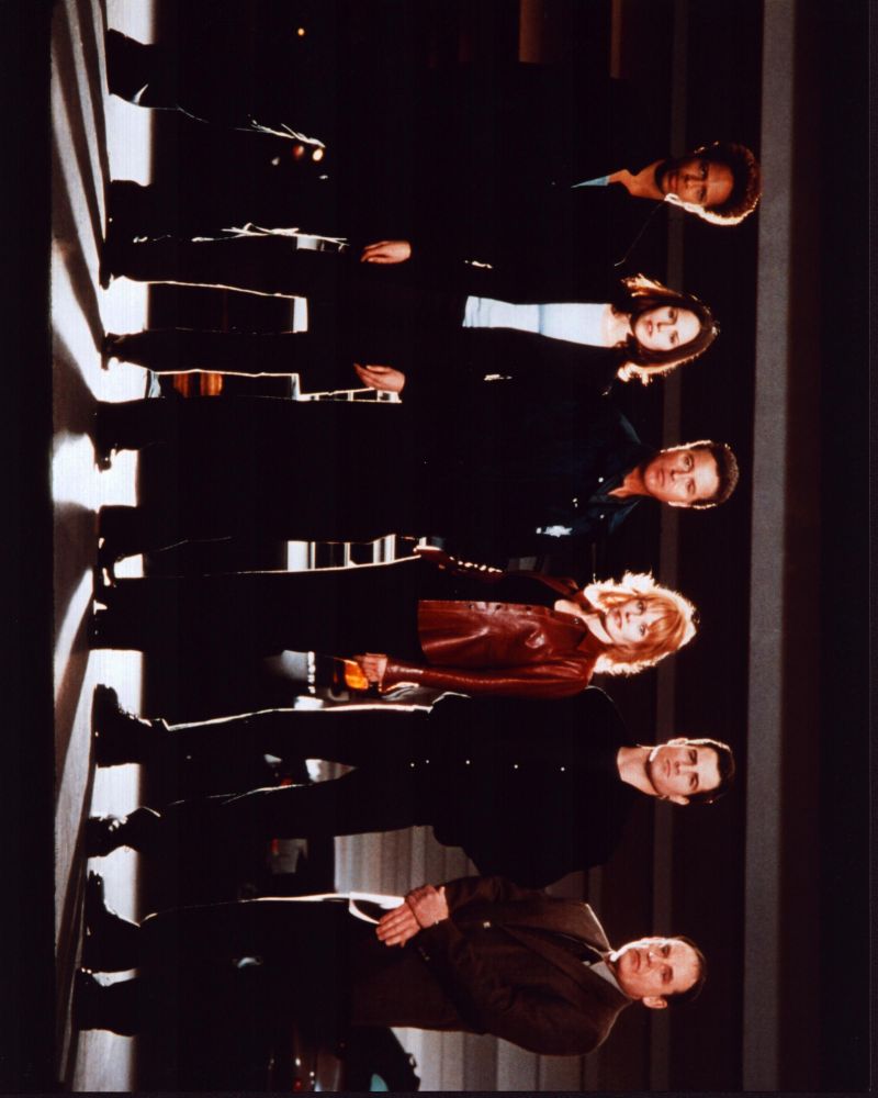 CSI: Crime Scene Investigation cast photo print in parking garage.