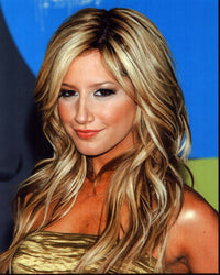 Close-up photo print of Ashley Tisdale in a glamorous gold dress