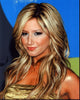 Close-up photo print of Ashley Tisdale in a glamorous gold dress