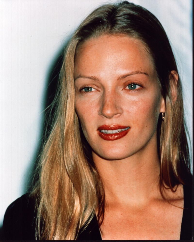 Close-up photo print of Uma Thurman in a black top