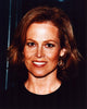 Close-up photo print of Sigourney Weaver in black top and gold earrings.