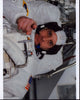 Garrett Reisman pointing in astronaut gear photo print.