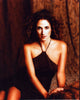 Melina Kanakaredes in a brown halter dress photo print.