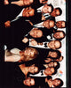 David Chase holding Golden Globe with The Sopranos cast photo print.