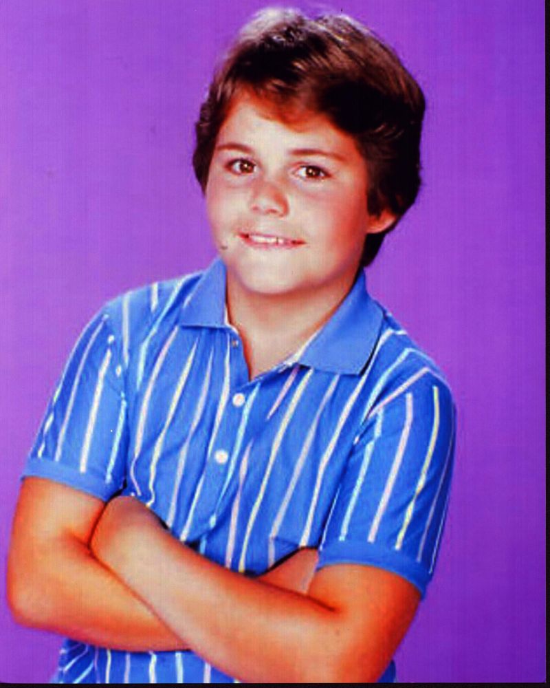 Jerry Supiran photo print in striped shirt with arms crossed, perfect for home decor.