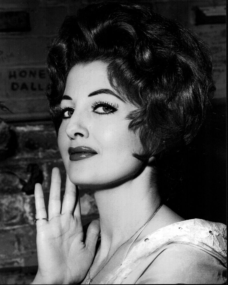 Black and white photo print of Tempest Storm headshot with hand on chin.