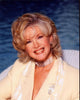 Connie Stevens headshot in yellow suit with pearl chokers photo print