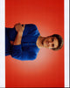 Beau Mirchoff photo print with arms crossed in blue long sleeve shirt