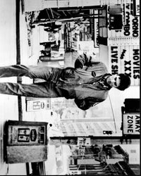 Robert De Niro walking down the street in Taxi Driver black and white photo print.