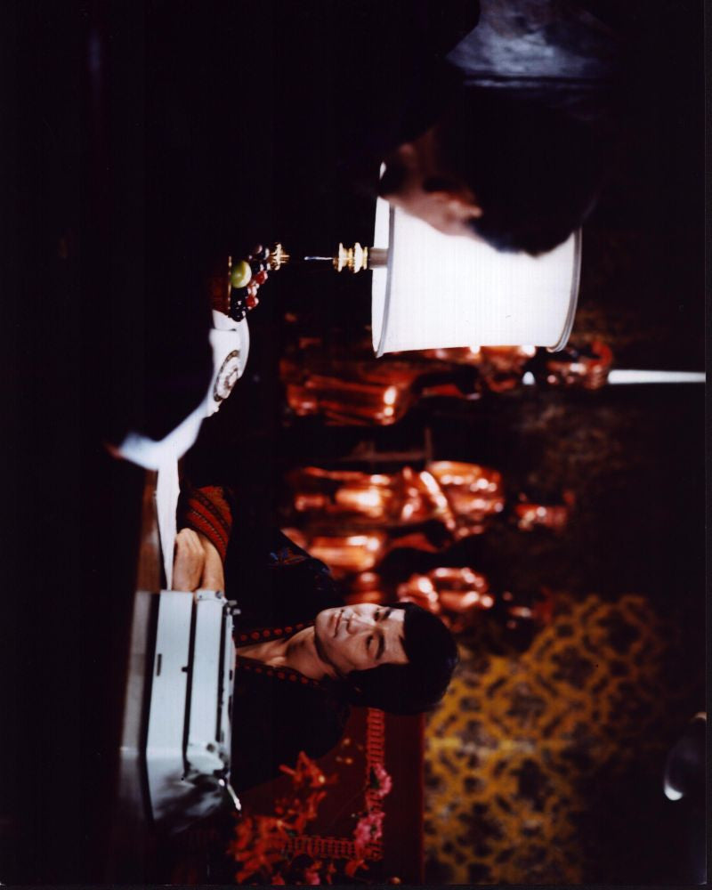Bruce Lee Sitting at Desk in Enter the Dragon Photo Print