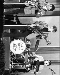 Dino, Desi & Billy performing in a black and white photo print