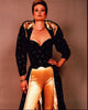 Deborah Rennard photo print in gold and black outfit