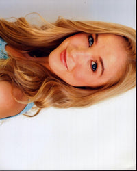 Lily Gibson headshot photo print in blue top