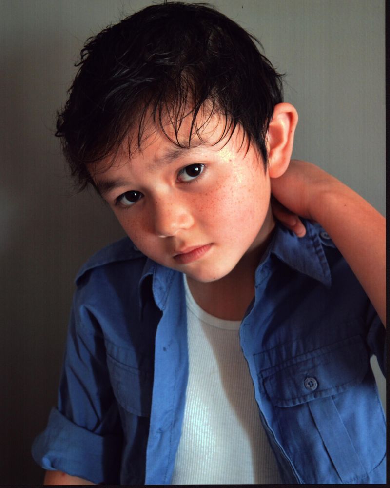 Tate Yap In Blue Button Down Photo Print showcasing vibrant colors and stylish design.