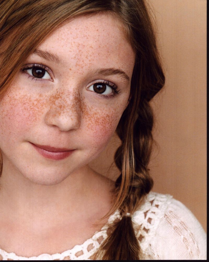 Cozi Zuehlsdorff headshot photo print in white top