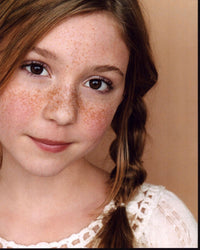 Cozi Zuehlsdorff headshot photo print in white top
