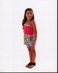 Michela Luci In Pank And Animal Print Romper Photo Print showcasing vibrant colors and stylish design.