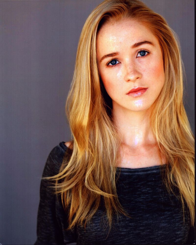 Lily Gibson headshot photo print featuring a chic gray top