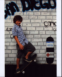 Nolan Gould Skateboarding Photo Print showcasing dynamic action.