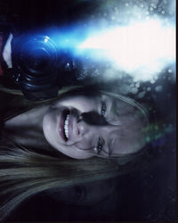 Olivia Dejonge crying holding a camera in The Visit photo print.