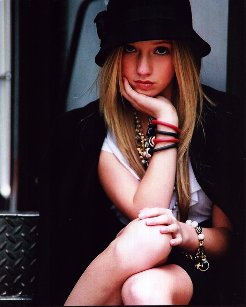 Madison Leisle wearing a stylish hat with bracelets photo print