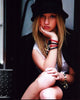Madison Leisle wearing a stylish hat with bracelets photo print