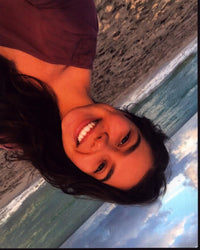 Auli'i Cravalho beach photo print showcasing her joyful presence.