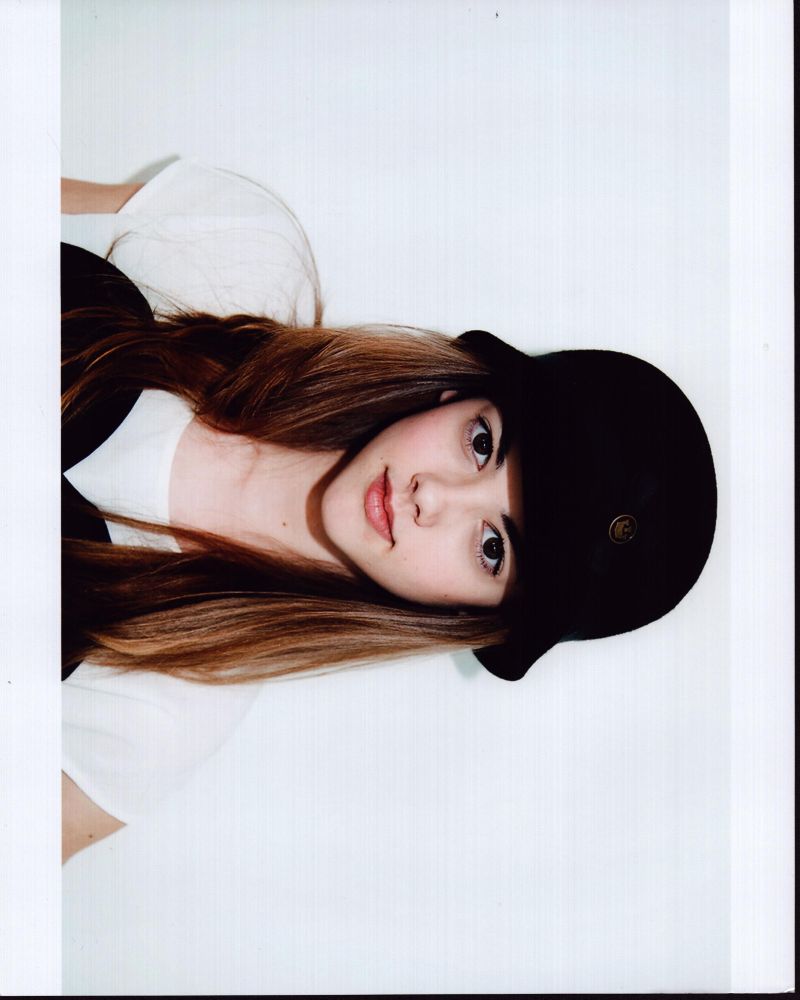 Mckaley Miller headshot in black bucket hat photo print
