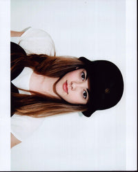 Mckaley Miller headshot in black bucket hat photo print